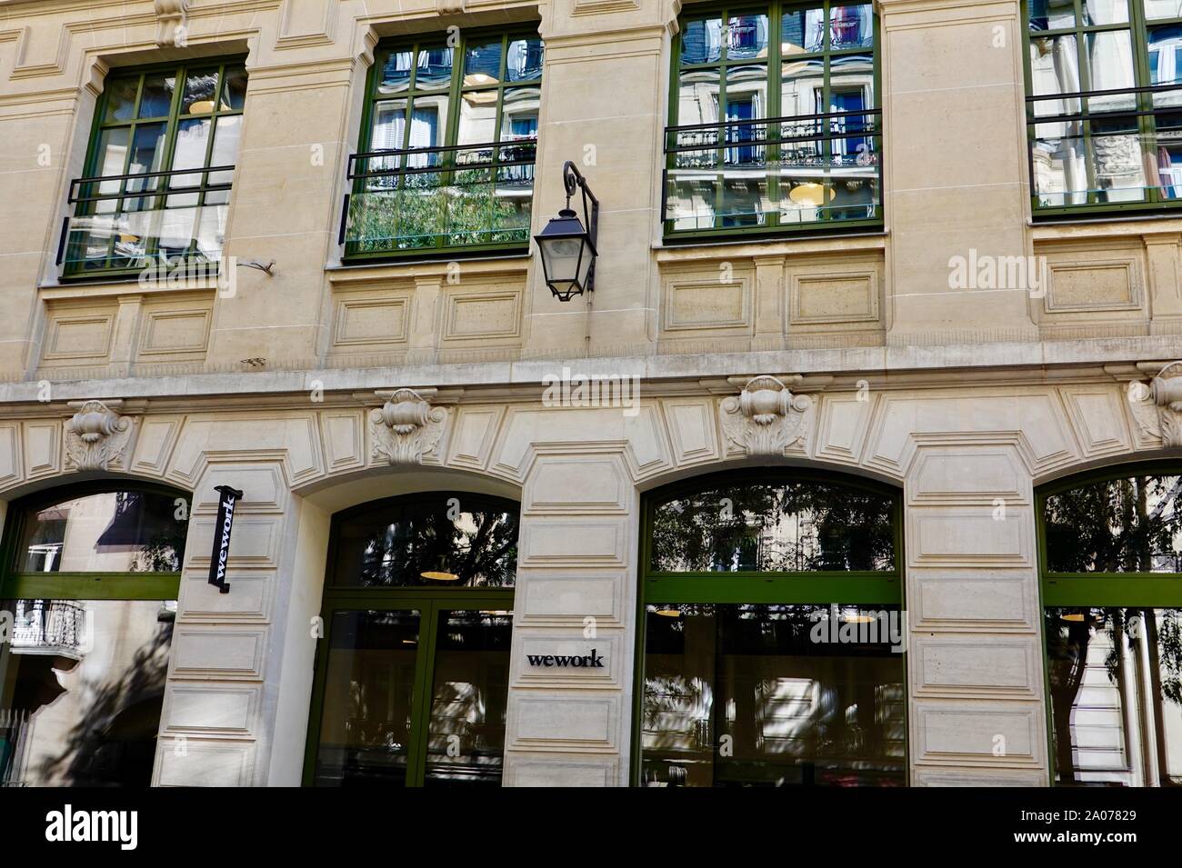 Front facade of WeWork building, with sign, rue des Archives, Paris
