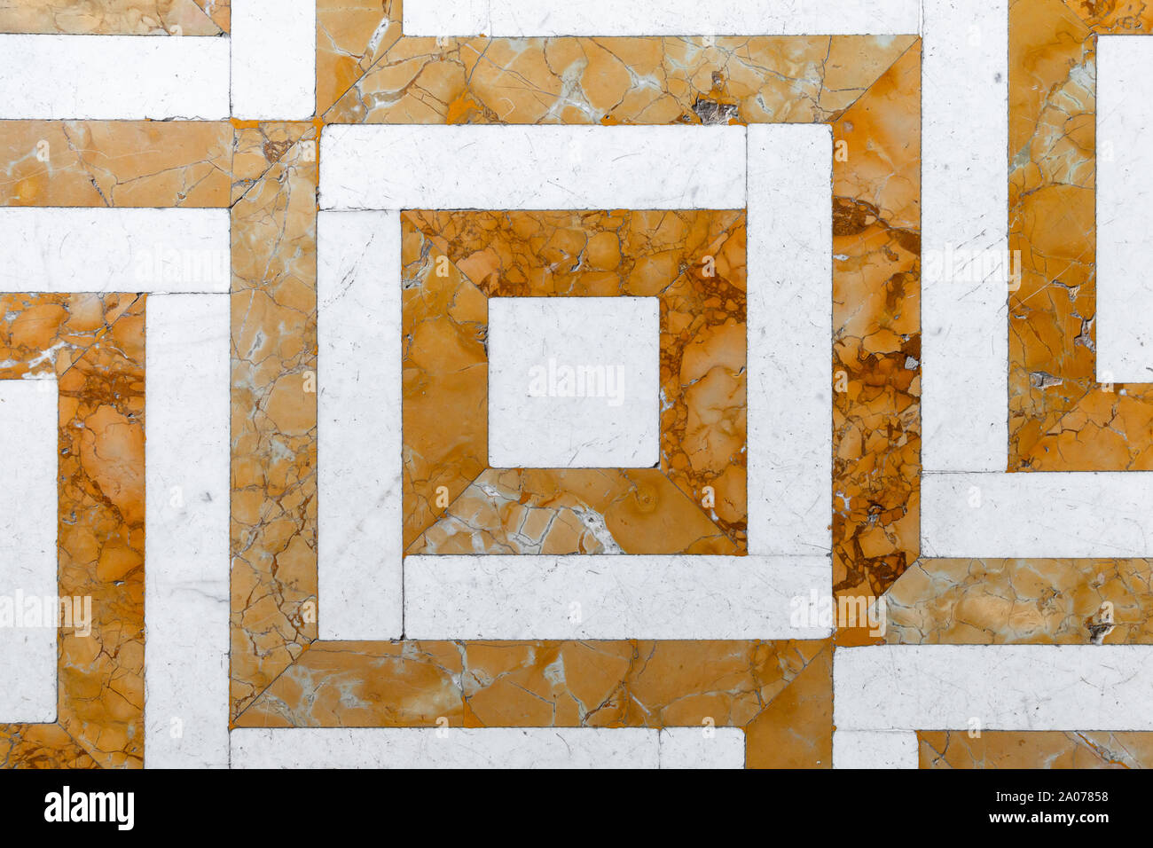 Vintage stone mosaic floor tiling with yellow white geometric pattern ...
