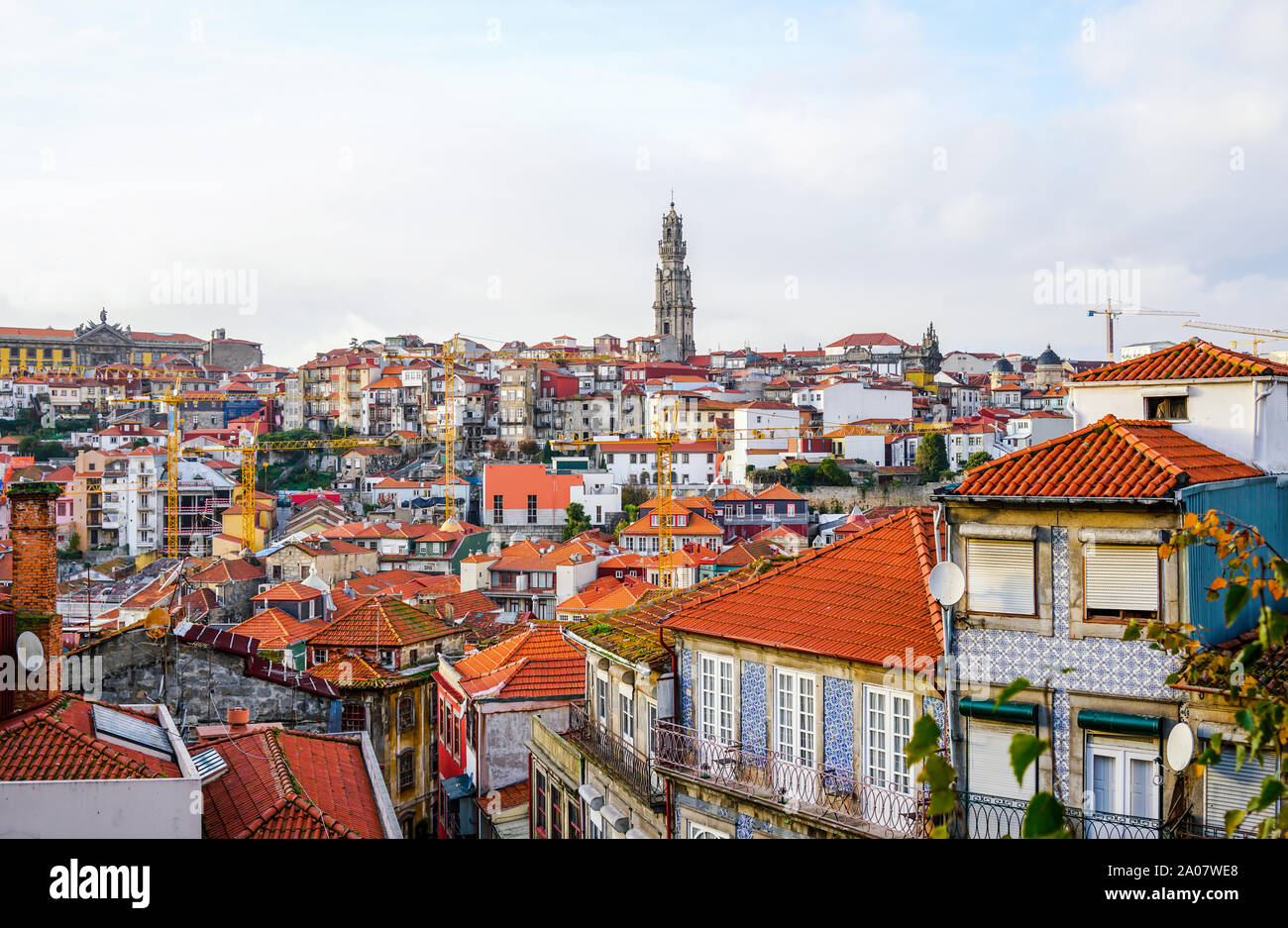 View from the Porto Cathedral overseeing traditional Porto houses, with tower of Clerigos Church far away in the middle. Stock Photo