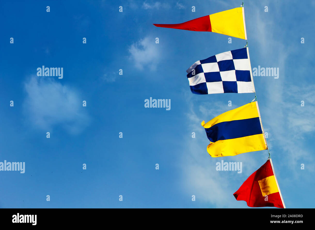 Marine signal flags on a blue sky background taken closeup Stock Photo ...