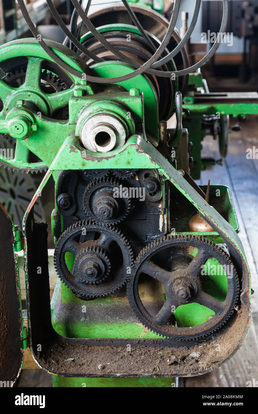 Drive gears of an antique beltdriven metal lathe at the heritage