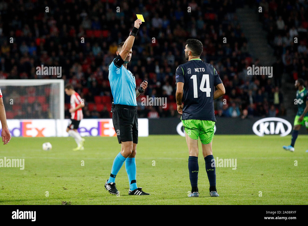 Eindhoven, Netherlands. 19th Sep, 2019. EINDHOVEN, PSV - Sporting Clube de Portugal SCP, 19-09-2019, football, season 2019-2020, Europa League Group Stage, Philips Stadium, referee Ivan Kruzliak and Sporting CP player Luis Neto Credit: Pro Shots/Alamy Live News Stock Photo