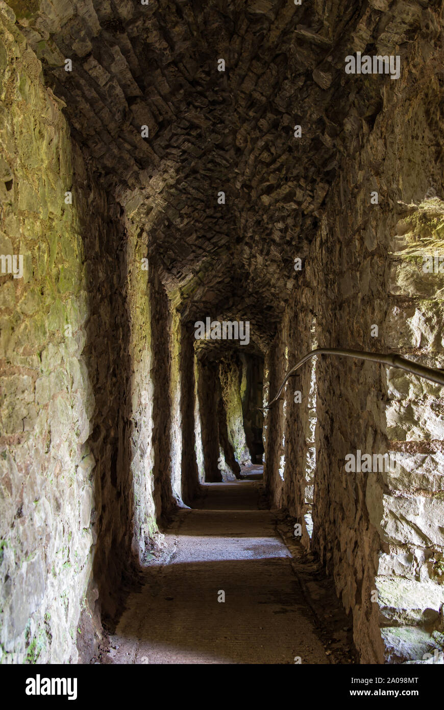 Passageway beneath Carreg Cennen castle, Wales Stock Photo