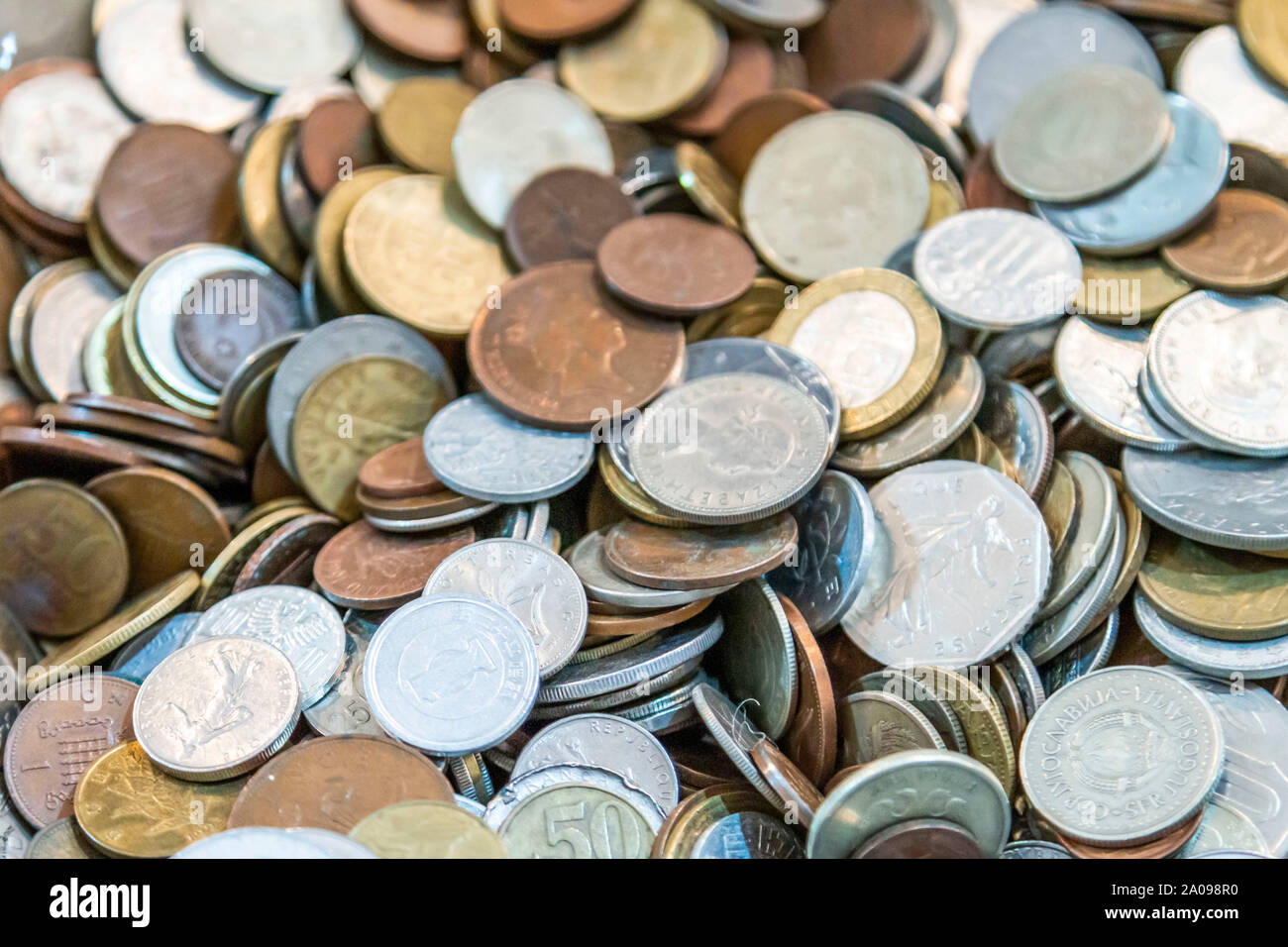 Old antique coins on display in antique shop Stock Photo Alamy