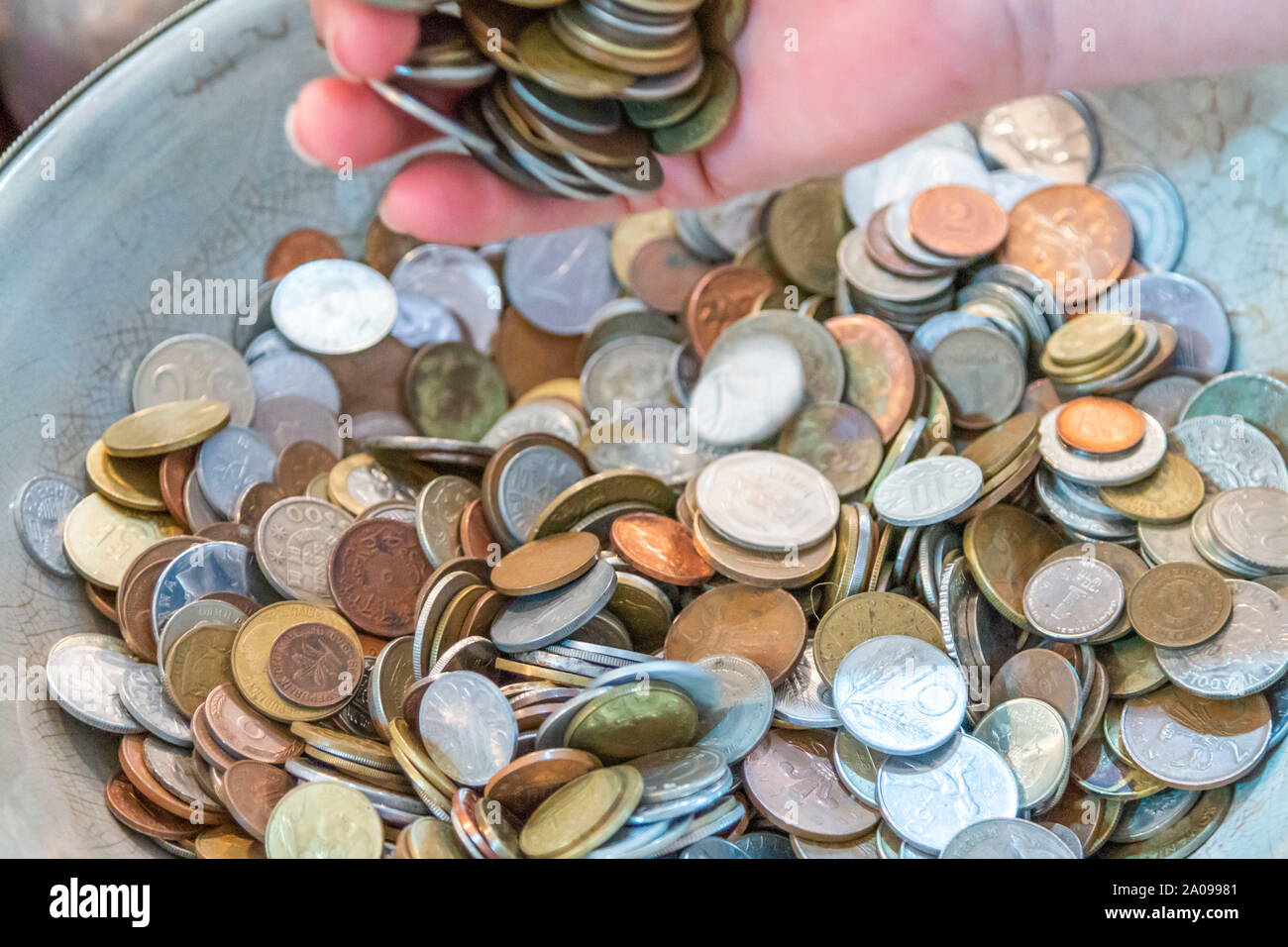 Old antique coins on display in antique shop Stock Photo Alamy