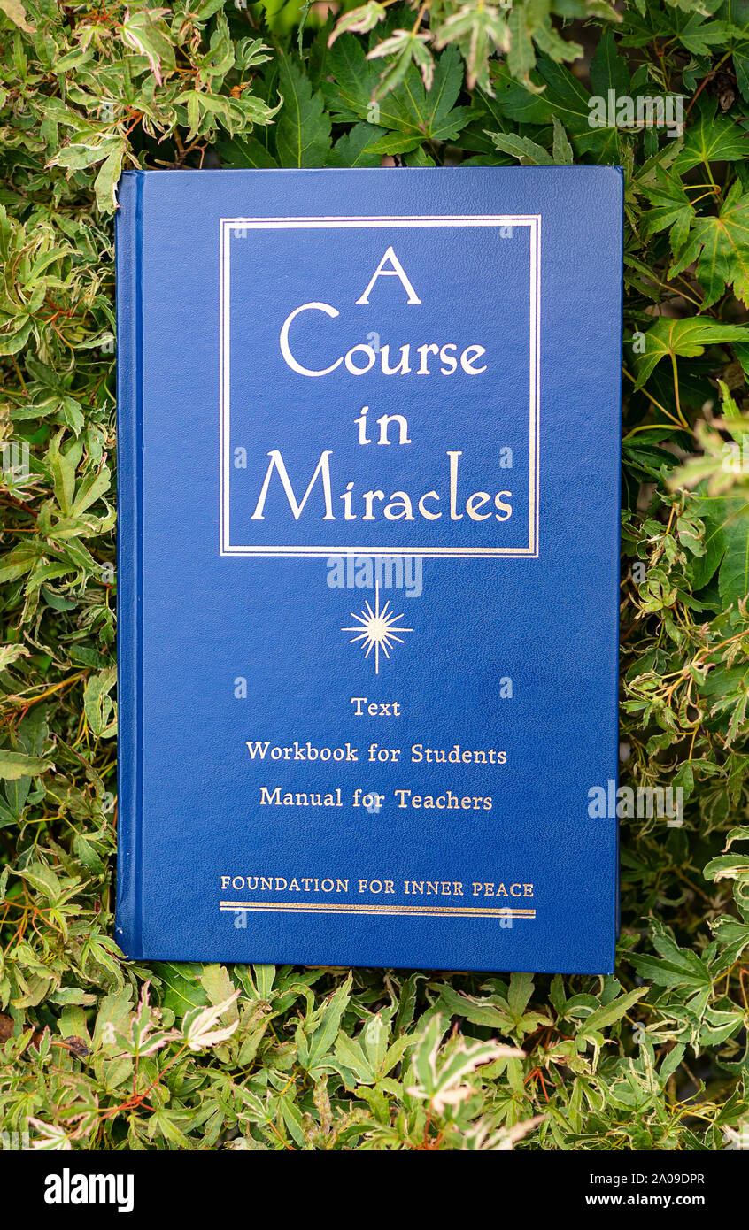 Glasgow/Scotland - September 5th 2019: a book titled ' a course in miracles.' Stock Photo