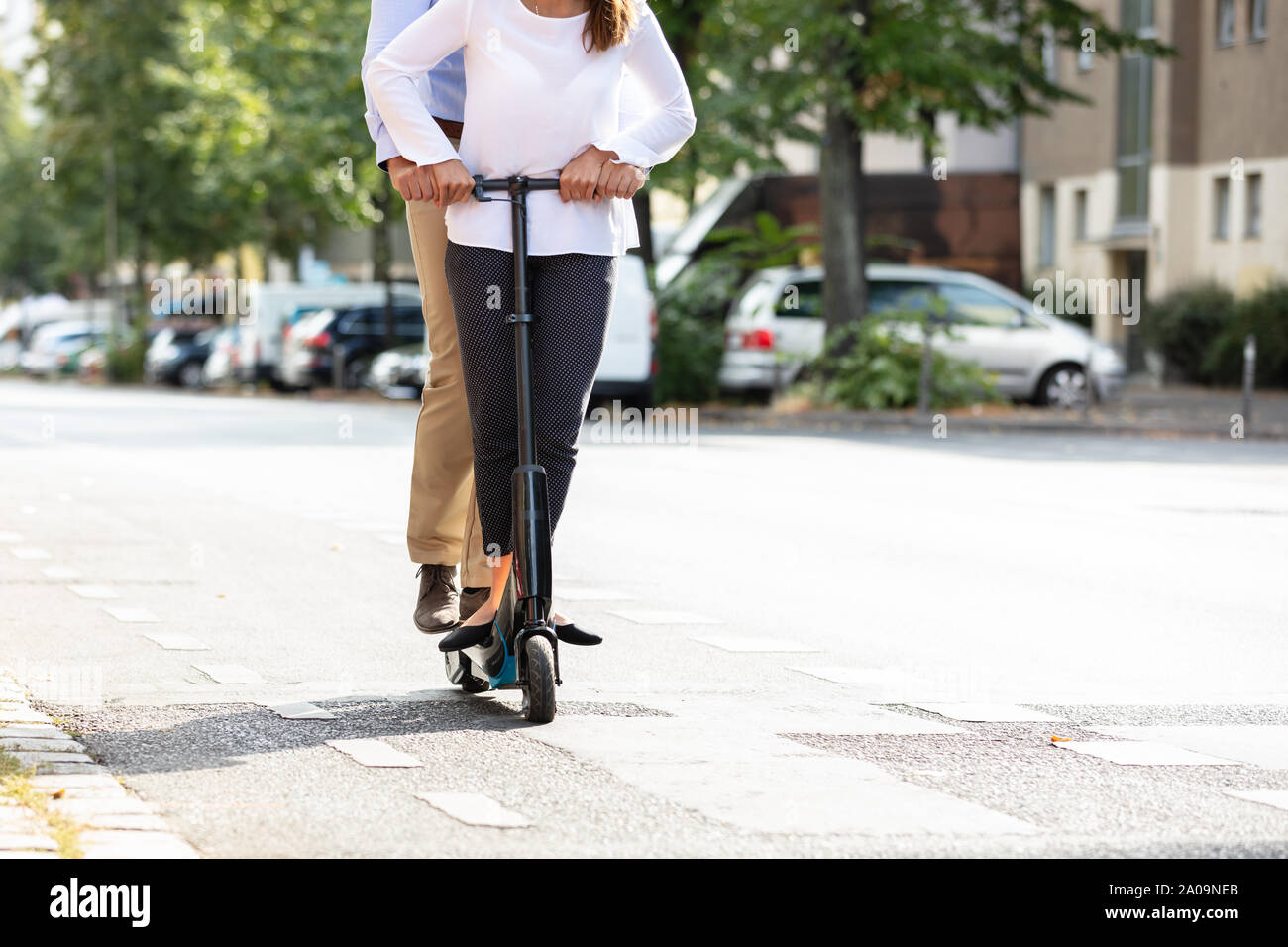 Man riding on an e scooter hi-res stock photography and images - Alamy