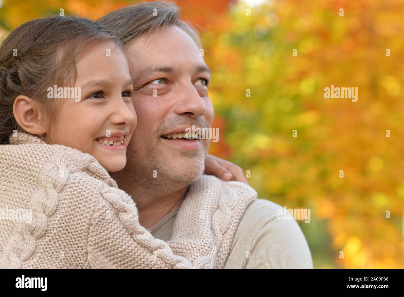 Portrait of father and cute daughter having fun outdoors Stock Photo