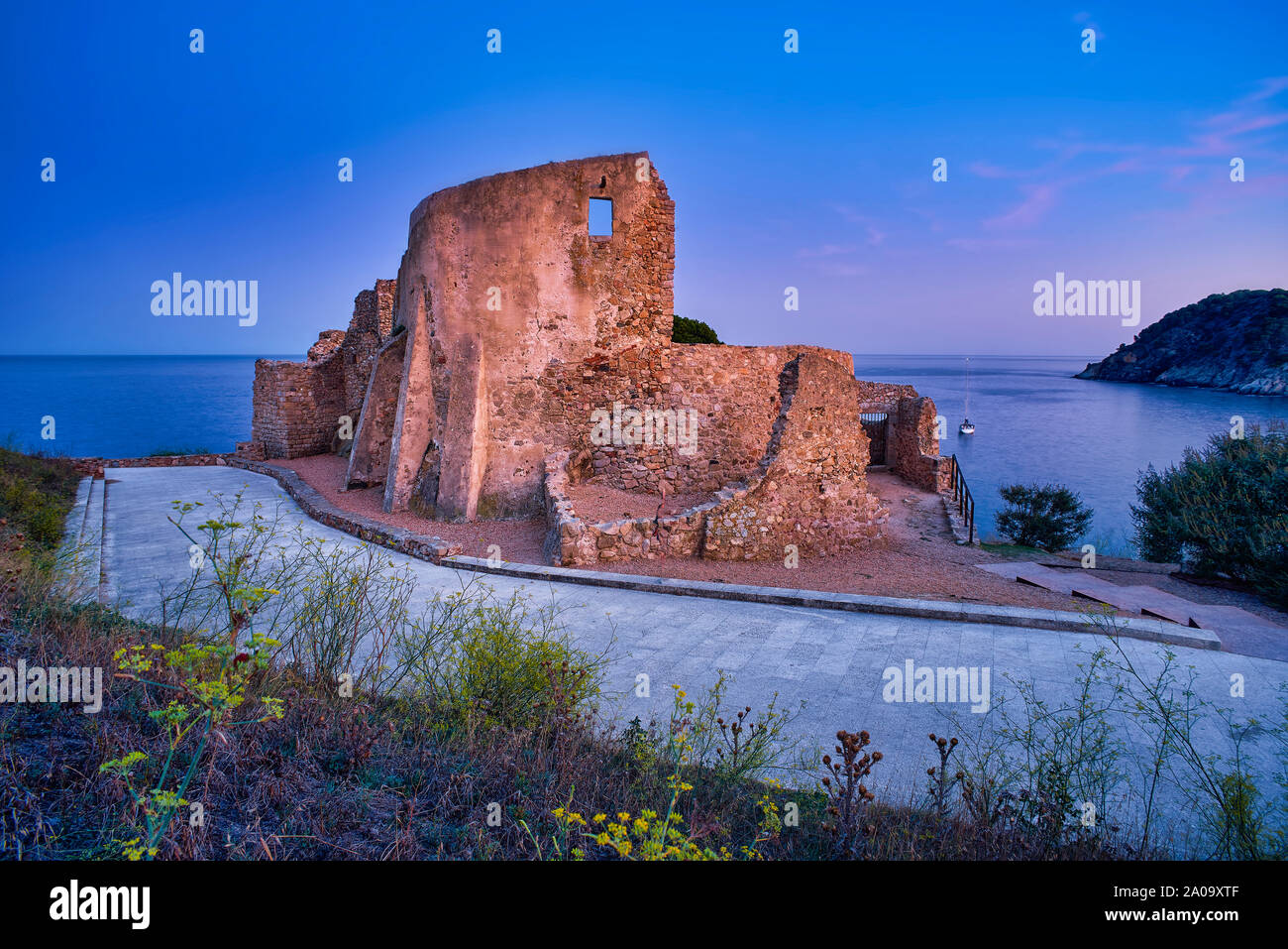 Castle of Sant Esteve at nightfall. La Fosca Cove. Palamos, Girona province, Catalonia, Spain. Stock Photo
