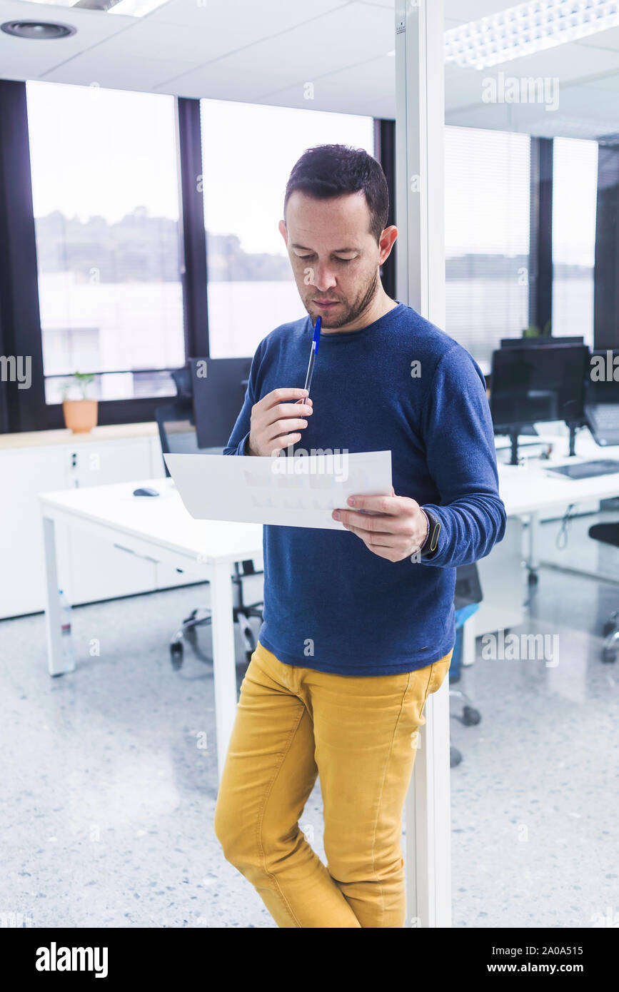 businessman looking at documents Stock Photo