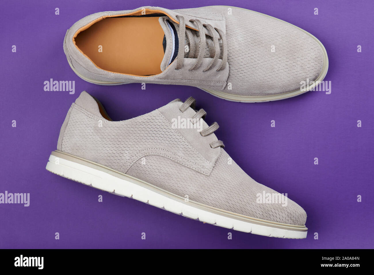 Pair of gray casual man shoes above top view Stock Photo