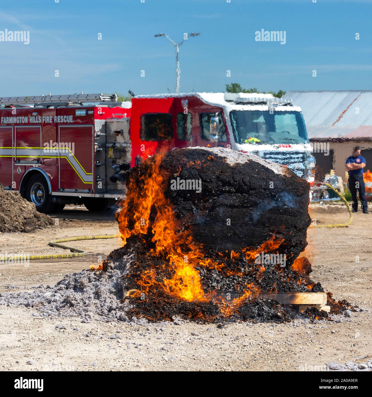 Farmington Hills, Michigan, USA. 19th Sep, 2019. After setting a Guinness World Record as the world's largest ball of dryer lint, firefighters set a 690-pound lint ball on fire as a warning about the danger of dryer fires due to uncleaned vents. The U.S. government says about 2,900 home dryer fires occur every year. A vent cleaning company, Dryer Vent Wizard, collected the lint from its franchisees. Credit: Jim West/Alamy Live News Stock Photo