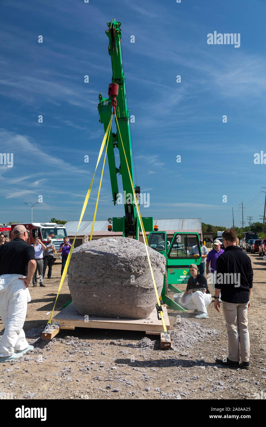 Farmington Hills, Michigan, USA. 19th Sep, 2019. A giant ball of dryer lint weighing 690 pounds set a Guinness World Record as the world's largest ball of lint. After it was weighed, firefighters burned the lint as a warning about the danger of dryer fires due to uncleaned vents. The U.S. government says about 2,900 home dryer fires occur every year. A vent cleaning company, Dryer Vent Wizard, collected the lint from its franchisees. Credit: Jim West/Alamy Live News Stock Photo