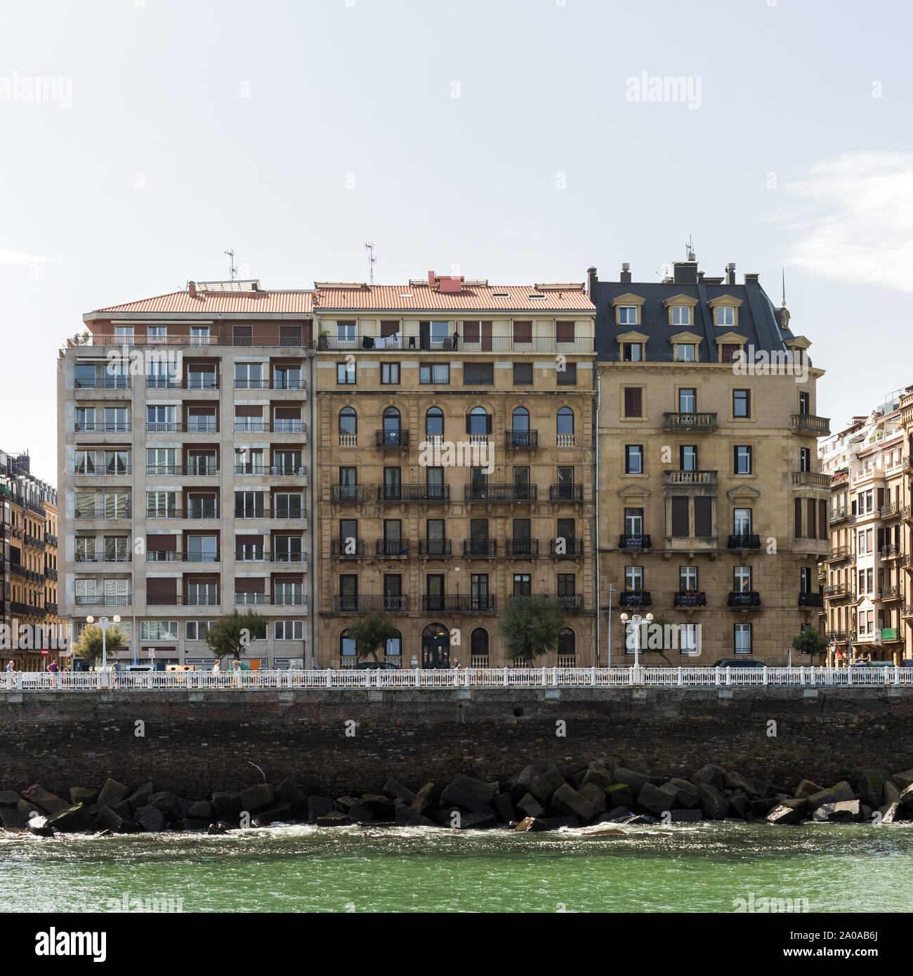 Apartment building near the mouth of a river in San Sebastian, Spain. Stock Photo