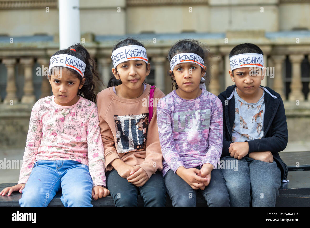 Four young children at a Kasmiri protes, UK Stock Photo