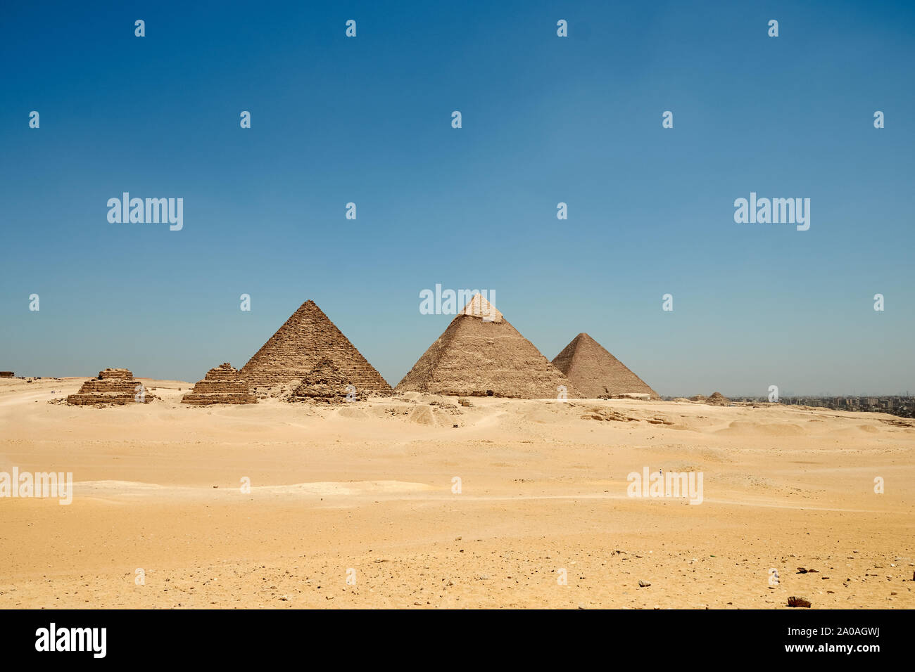 The Giza pyramid complex, also called the Giza Necropolis on the Giza Plateau in Egypt that includes the Great Pyramid of Giza, the Pyramid of Khafre, Stock Photo