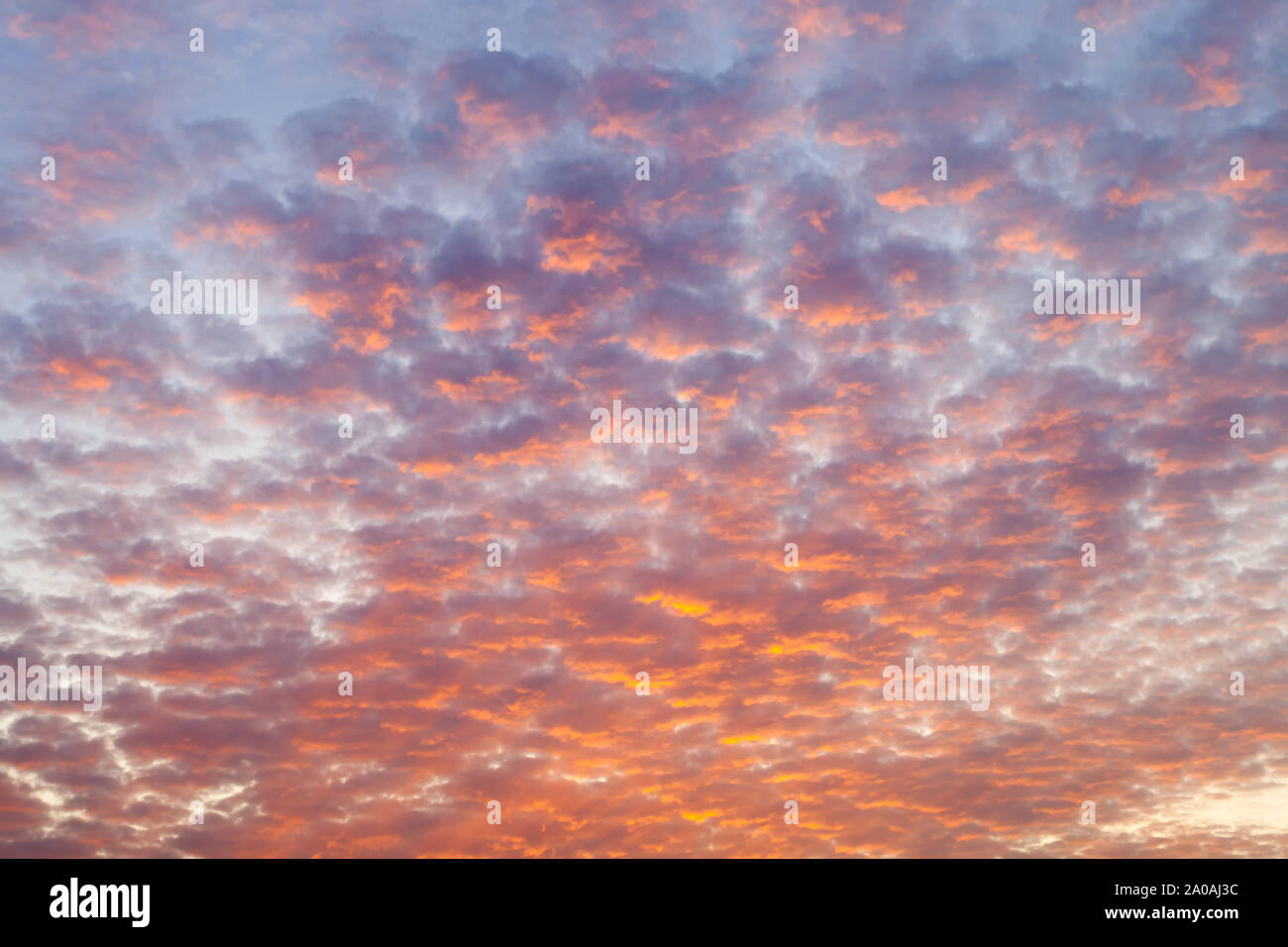 Beautiful colors of dramatic sunset sky and clouds with dramatic golden ...
