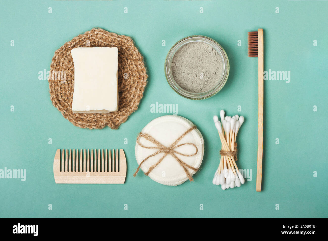 Set of eco-friendly plastic-free body care items on the mint background ...