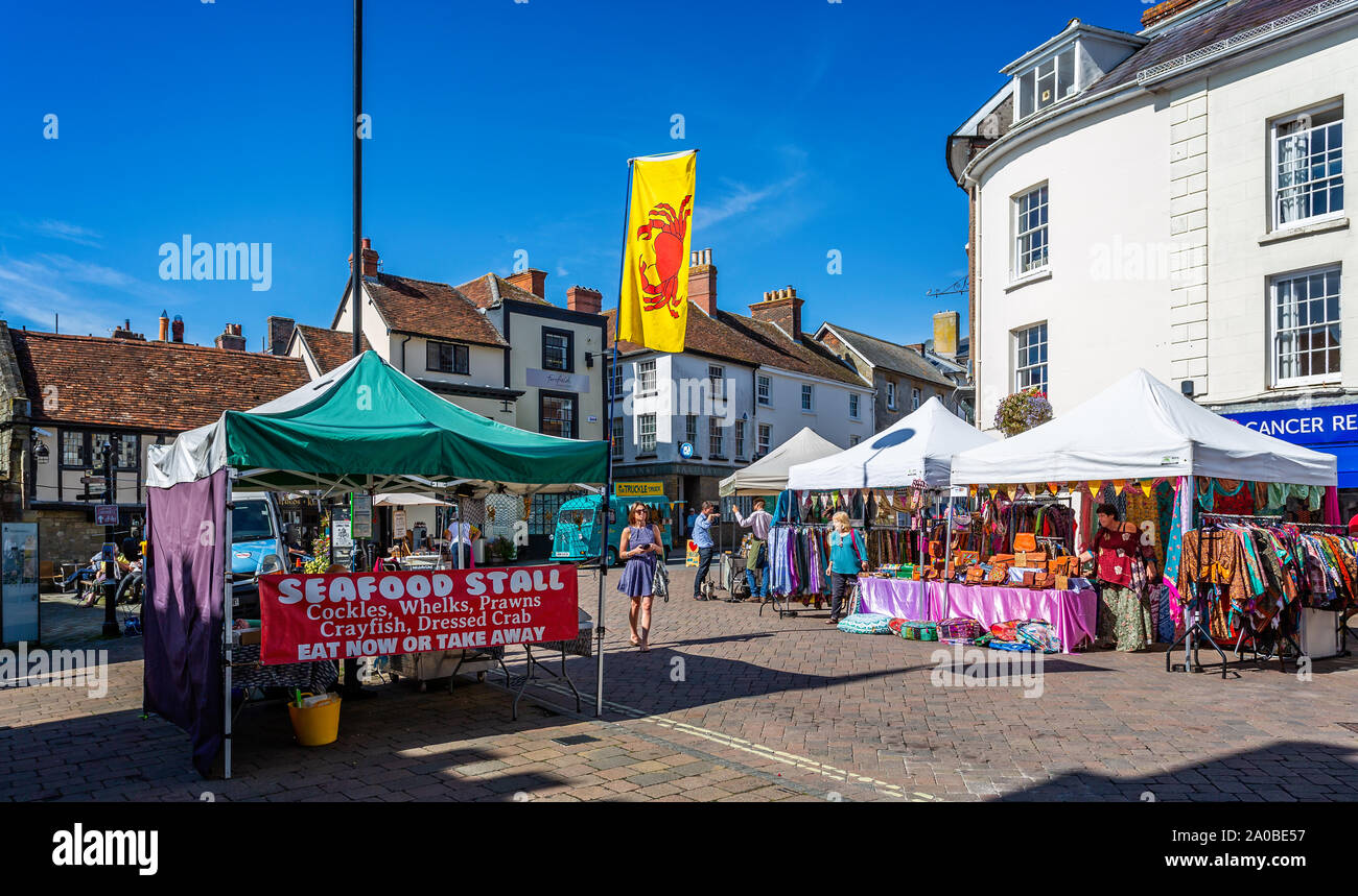 Outdoor street market in the High Street, Shaftesbury, Dorset, UK on 15