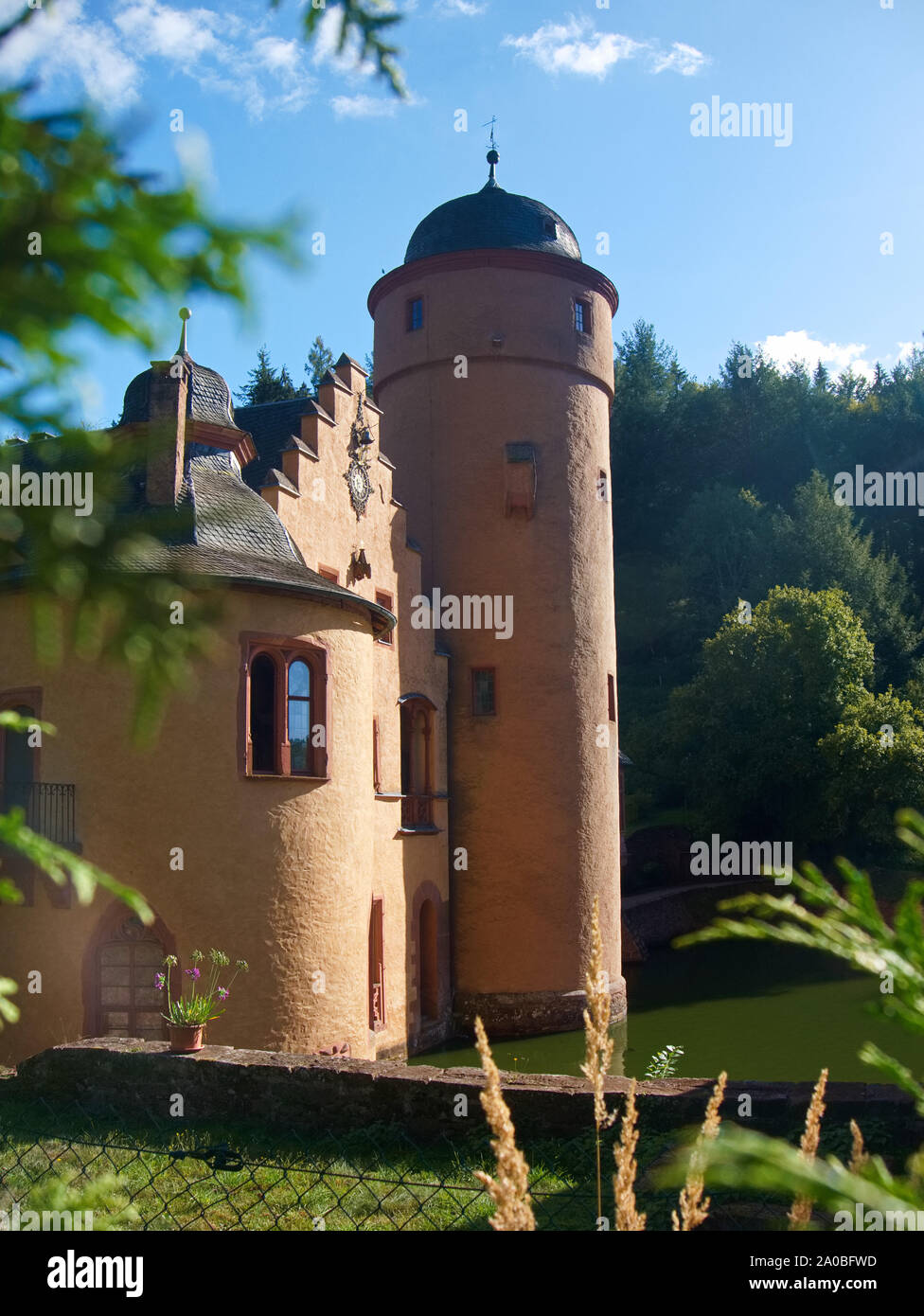 Tower and the left side of castle mespelbrunn Stock Photo