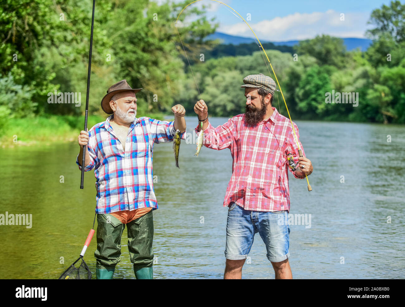 Fisherman with fishing rod. Activity and hobby. Fishing freshwater