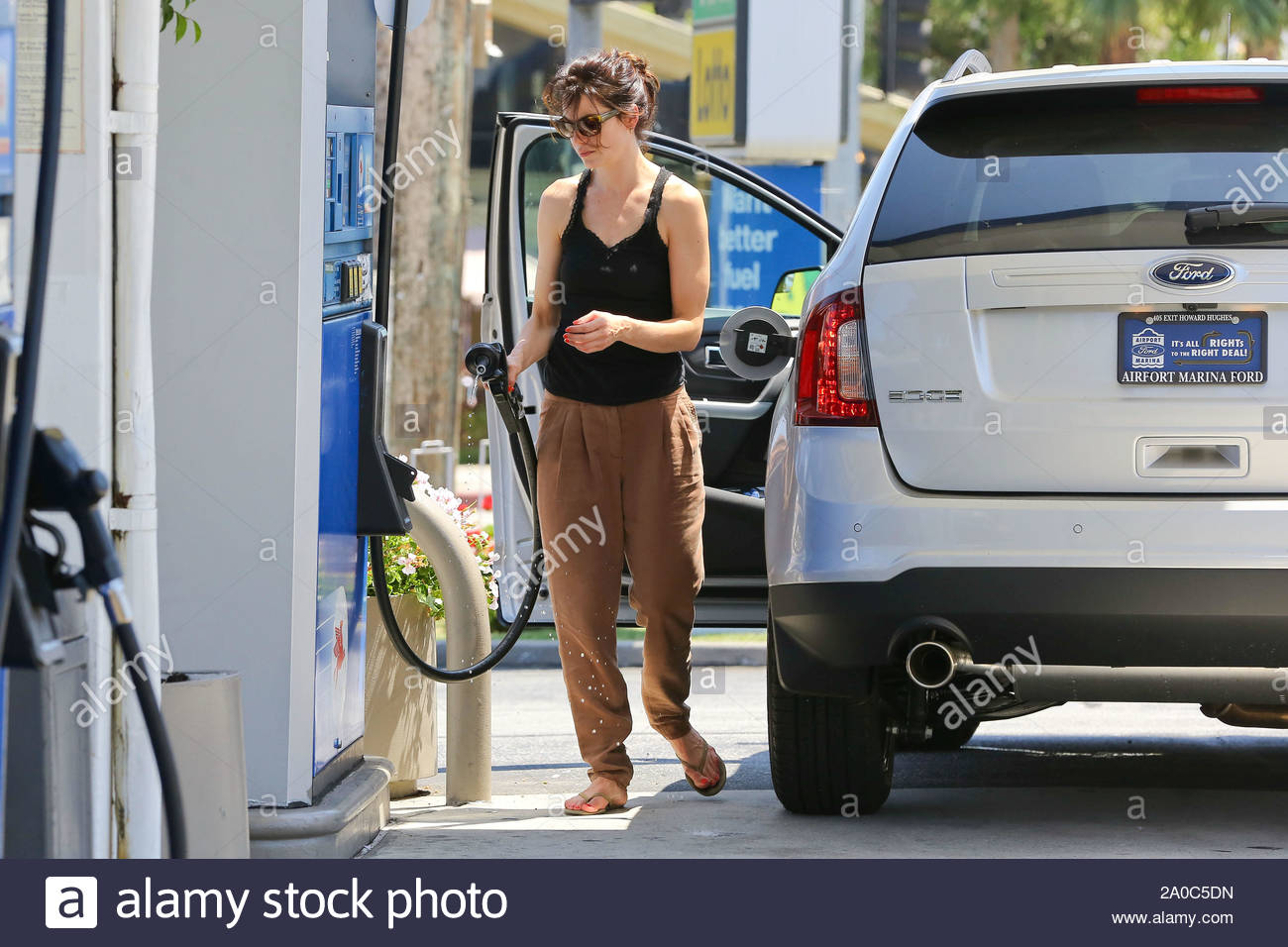 West Hollywood Ca Actress Michelle Monaghan Has Some Problems At The Gas Pump While Out With Her Brand New Ford Edge In Weho Akm Gsi June 20 2012 Stock Photo Alamy