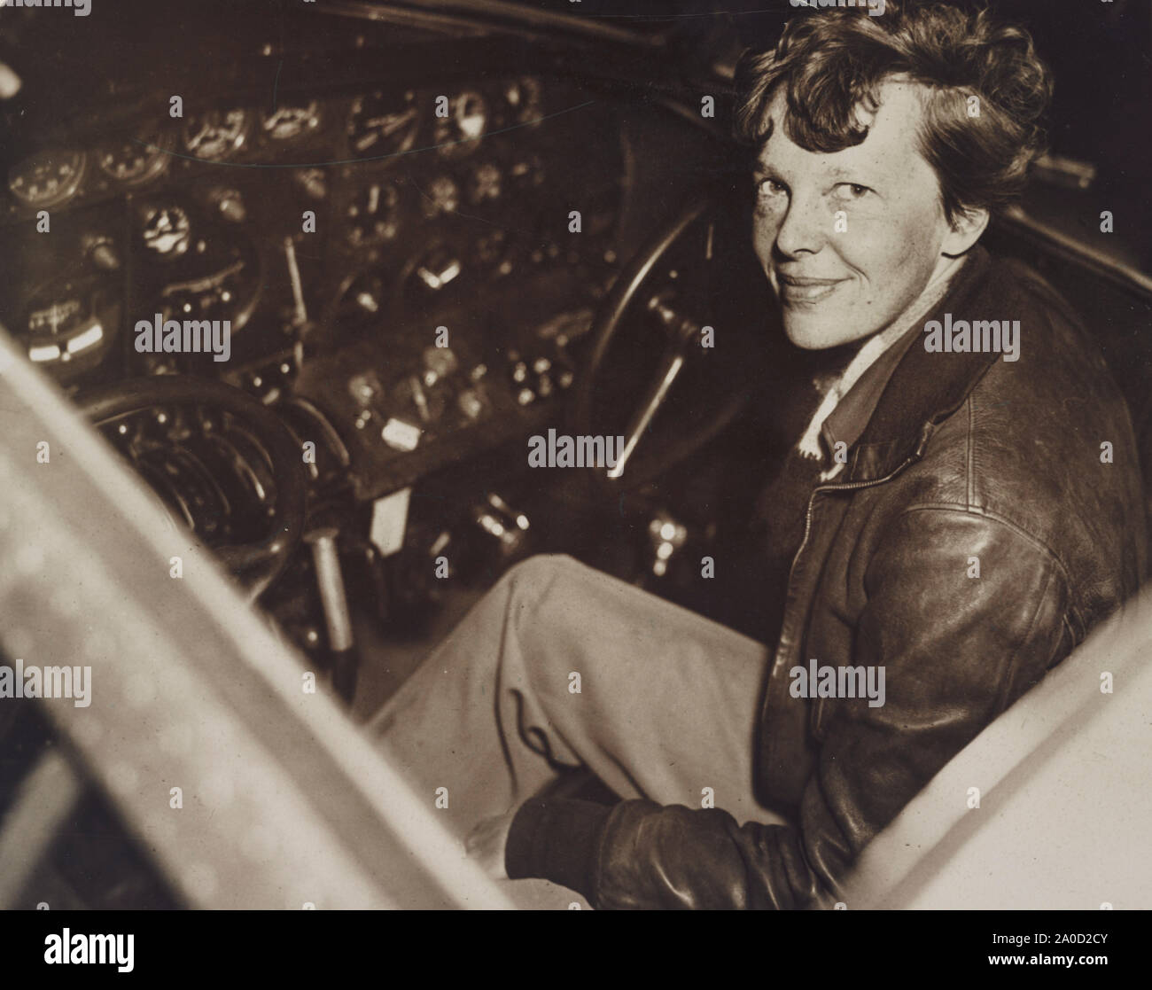 Amelia Earhart in the cockpit of her Lockheed Model 10-E Electra aircraft Stock Photo