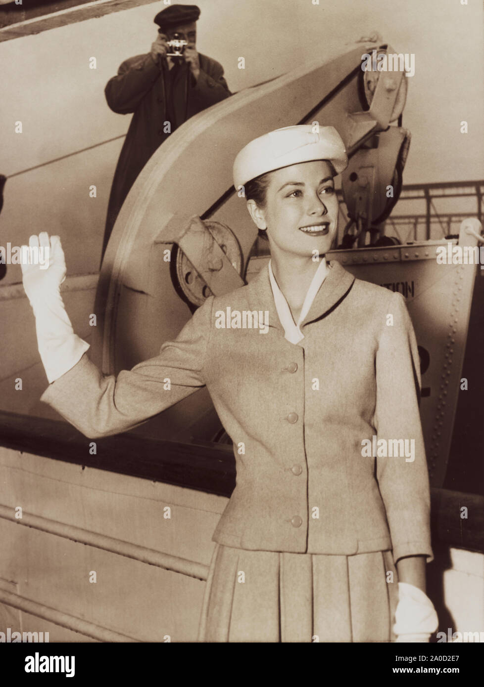 Movie star Grace Kelly waves goodbye to New York as she prepares to board the ocean liner Constitution to sail to Monaco where she will wed Prince Rainier of Monaco. Princess Grace died at Monaco Hospital on September 14, 1982, succumbing to injuries sustained in a traffic collision the day before. At the time of her death, she was 52 years old. Stock Photo