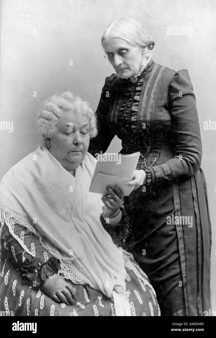Susan B. Anthony (standing) and Elizabeth Cady Stanton (seated). Susan B. Anthony (February 15, 1820 – March 13, 1906) was an American social reformer and women's rights activist who played a pivotal role in the women's suffrage movement. Born into a Quaker family committed to social equality, she collected anti-slavery petitions at the age of 17. In 1856, she became the New York state agent for the American Anti-Slavery Society.  In 1851, she met Elizabeth Cady Stanton, who became her lifelong friend and co-worker in social reform activities. Stock Photo