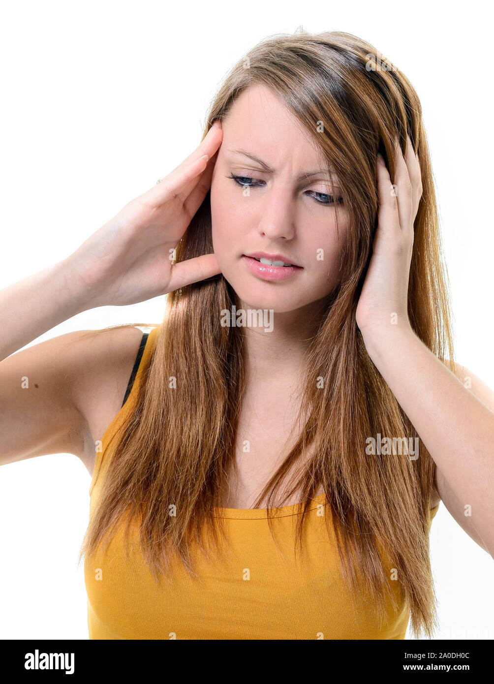 Young unhappy woman with severe headache holding forehead in pain Stock ...