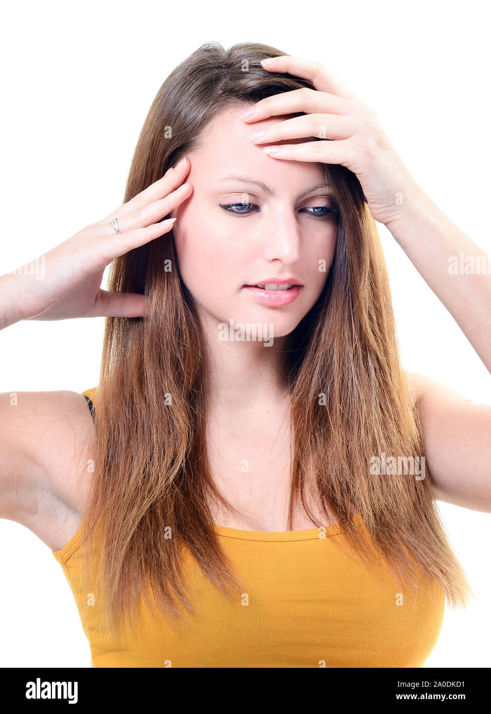 Young unhappy woman with severe headache holding forehead in pain Stock ...