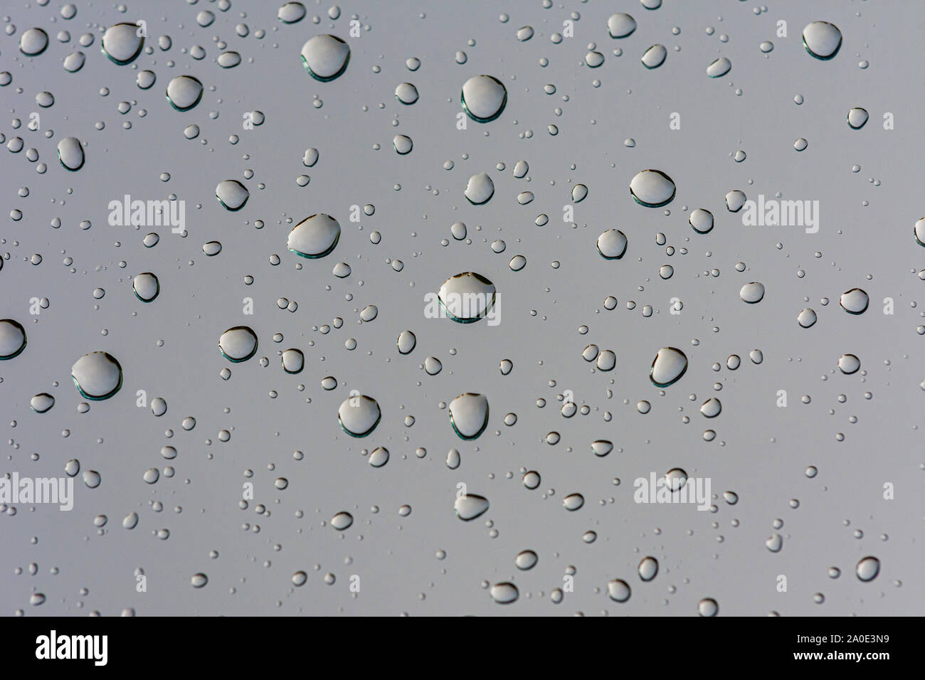 Rain drops collected on glass window pane during thunderstorm, Castle Rock Colorado US. Photo taken in early September. Stock Photo