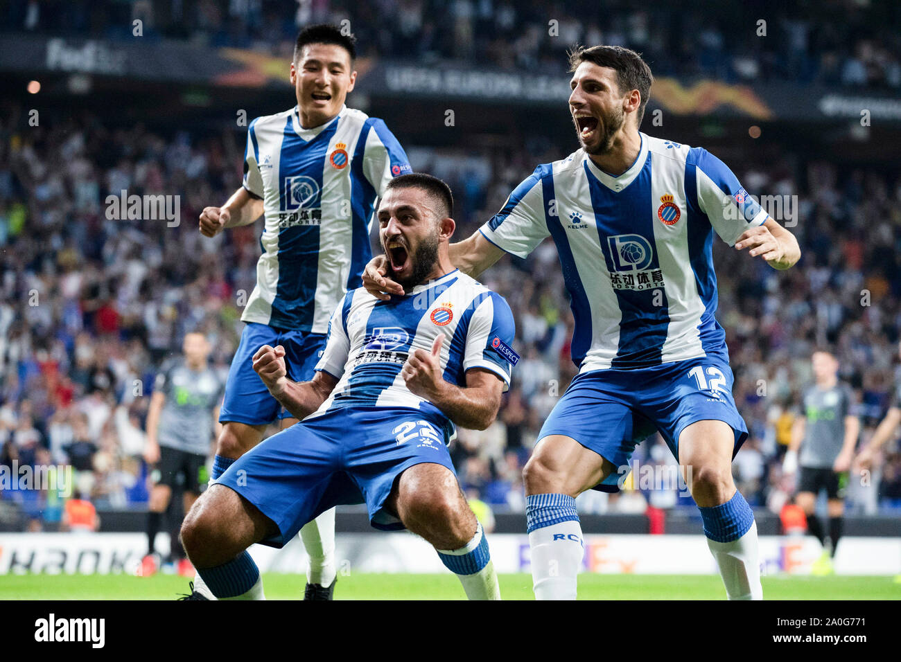 Barcelona, Spain. 19th Sep, 2019. Espanyol's Matias Vargas (C) celebrates his goal with Wu Lei (L) and Jonathan Calleri during a UEFA Europa League Group H soccer match between Spanish team RCD Espanyol and Hungarian team Ferencvaros in Barcelona, Spain, Sept. 19, 2019. Credit: Joan Gosa/Xinhua/Alamy Live News Stock Photo