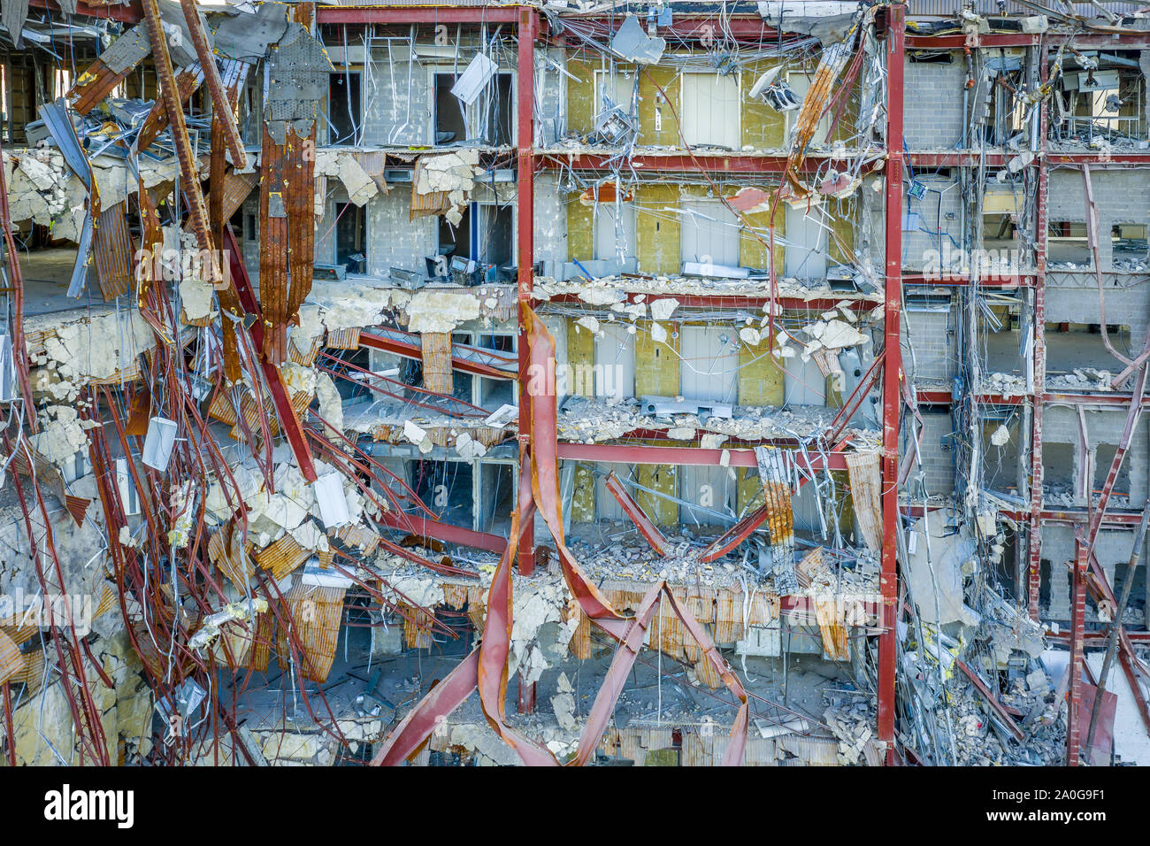 Aerial view of an office building under demolition by a wrecking ball in Columbia Town Center  Maryland new Washington DC Stock Photo