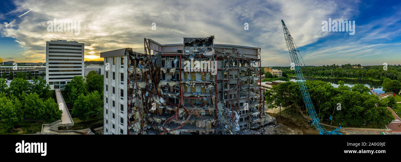 Aerial view of an office building under demolition by a wrecking ball in Columbia Town Center  Maryland new Washington DC Stock Photo