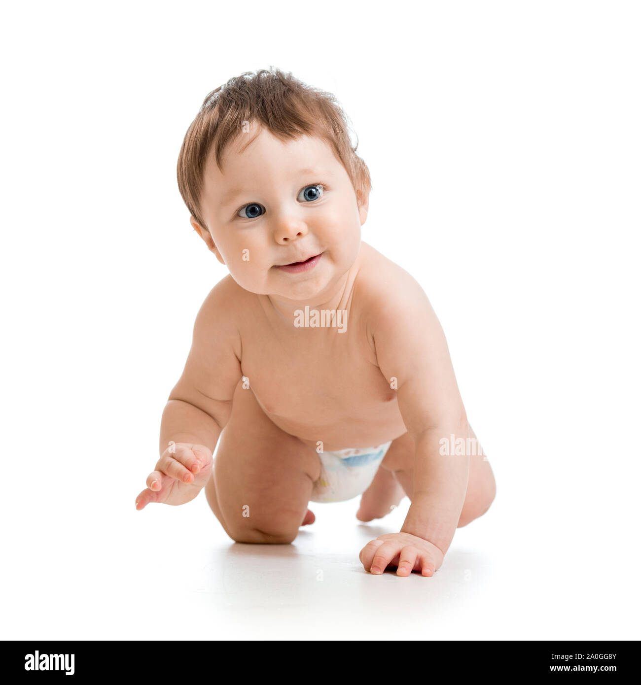 Little baby funny creeps. Kid boy is weared diaper. Isolated on white Stock Photo