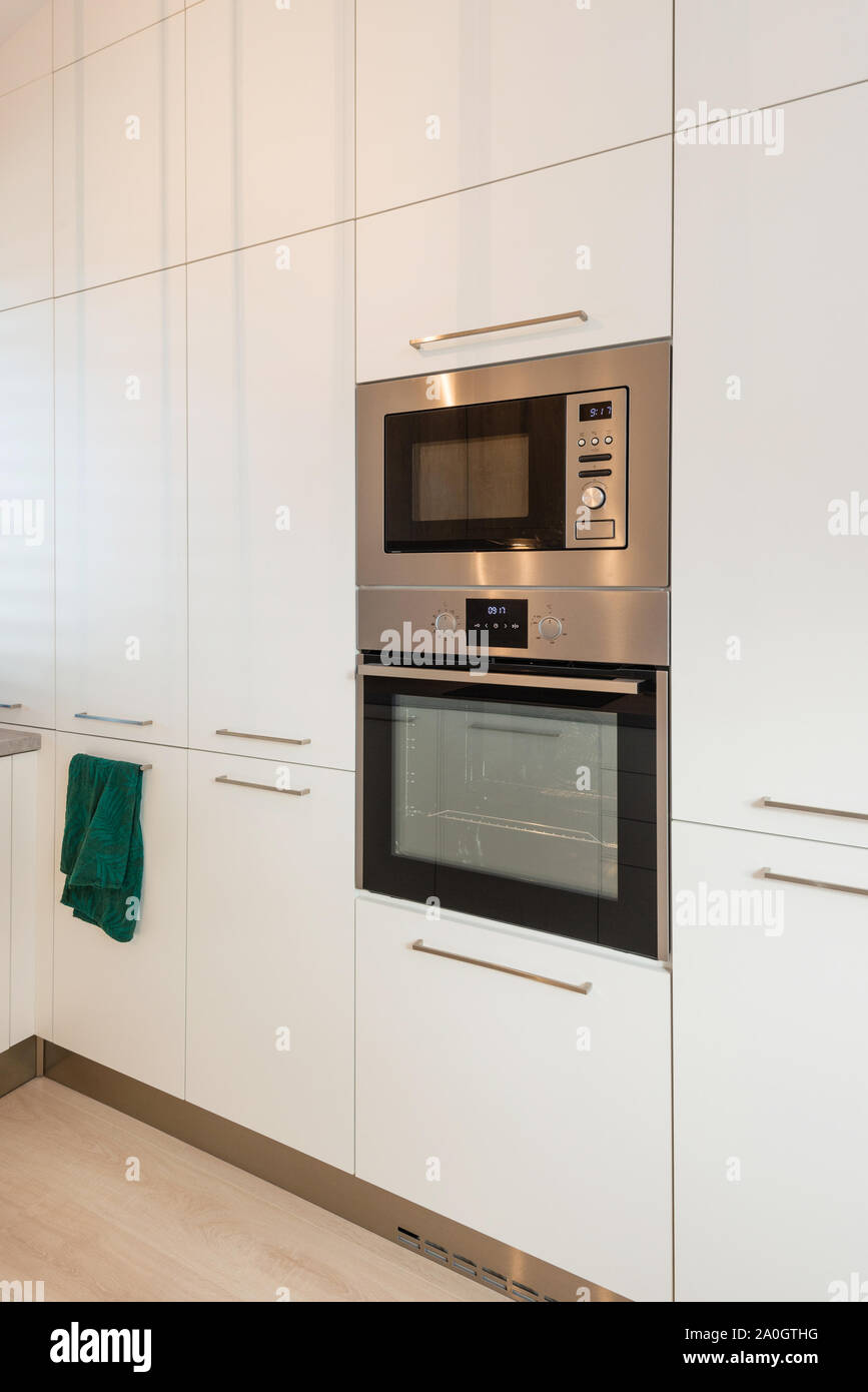 Interior of contemporary kitchen with built-in appliances Stock Photo