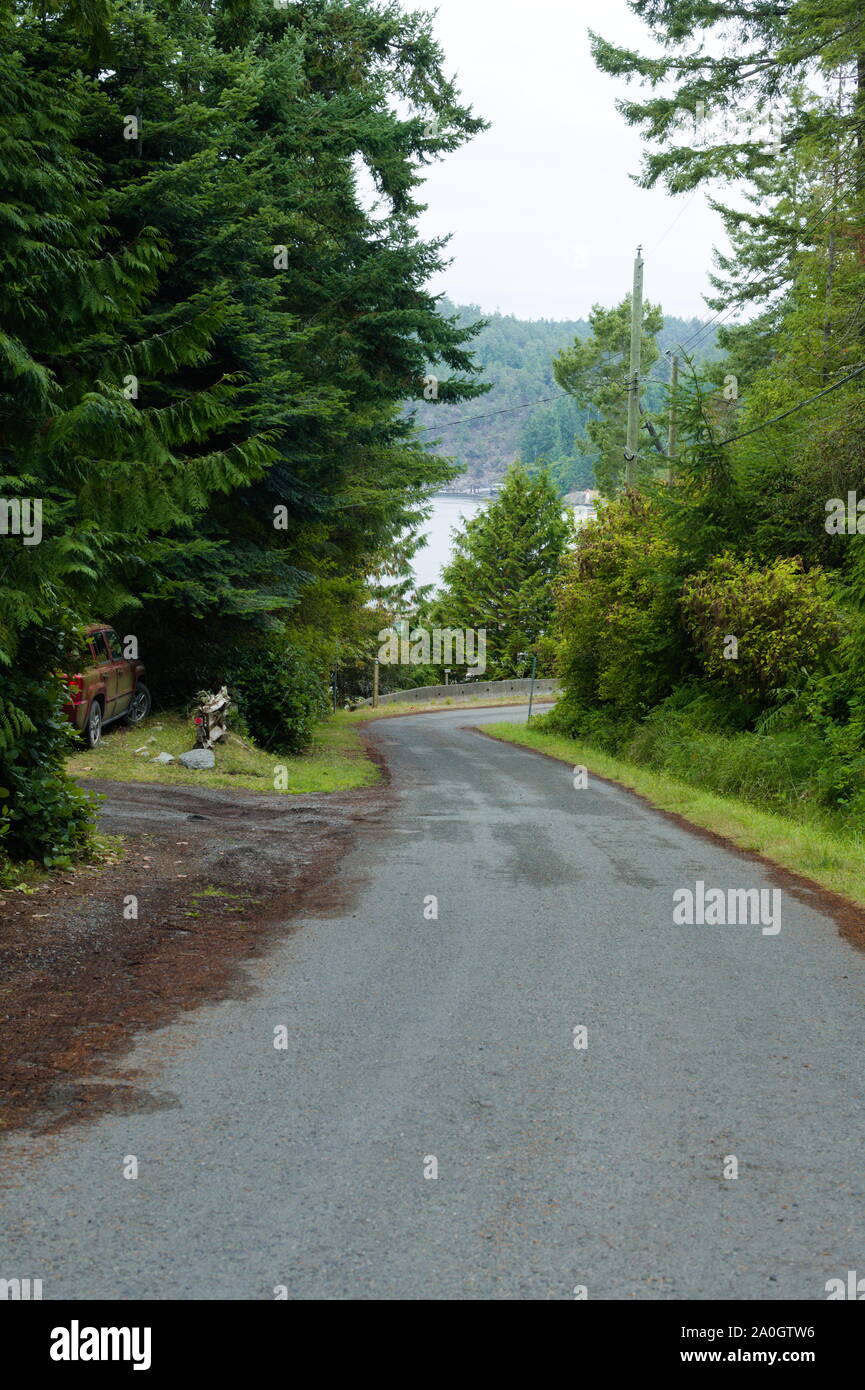 Country road, island life in Trincomali, North Pender Island, British Columbia, Canada Stock Photo