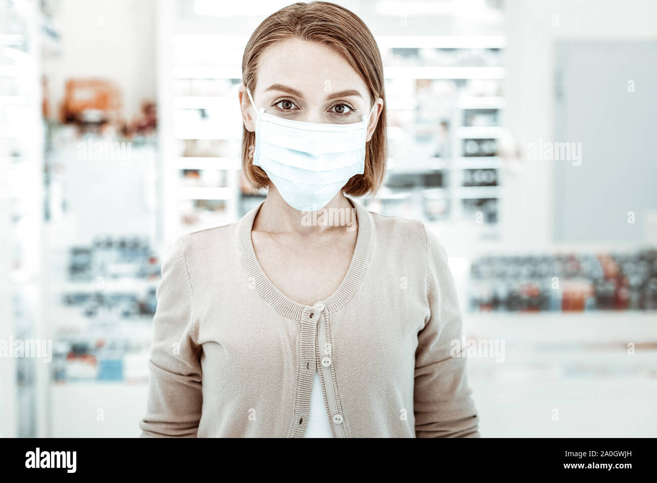 Mature woman wearing facial mask hi-res stock photography and images ...