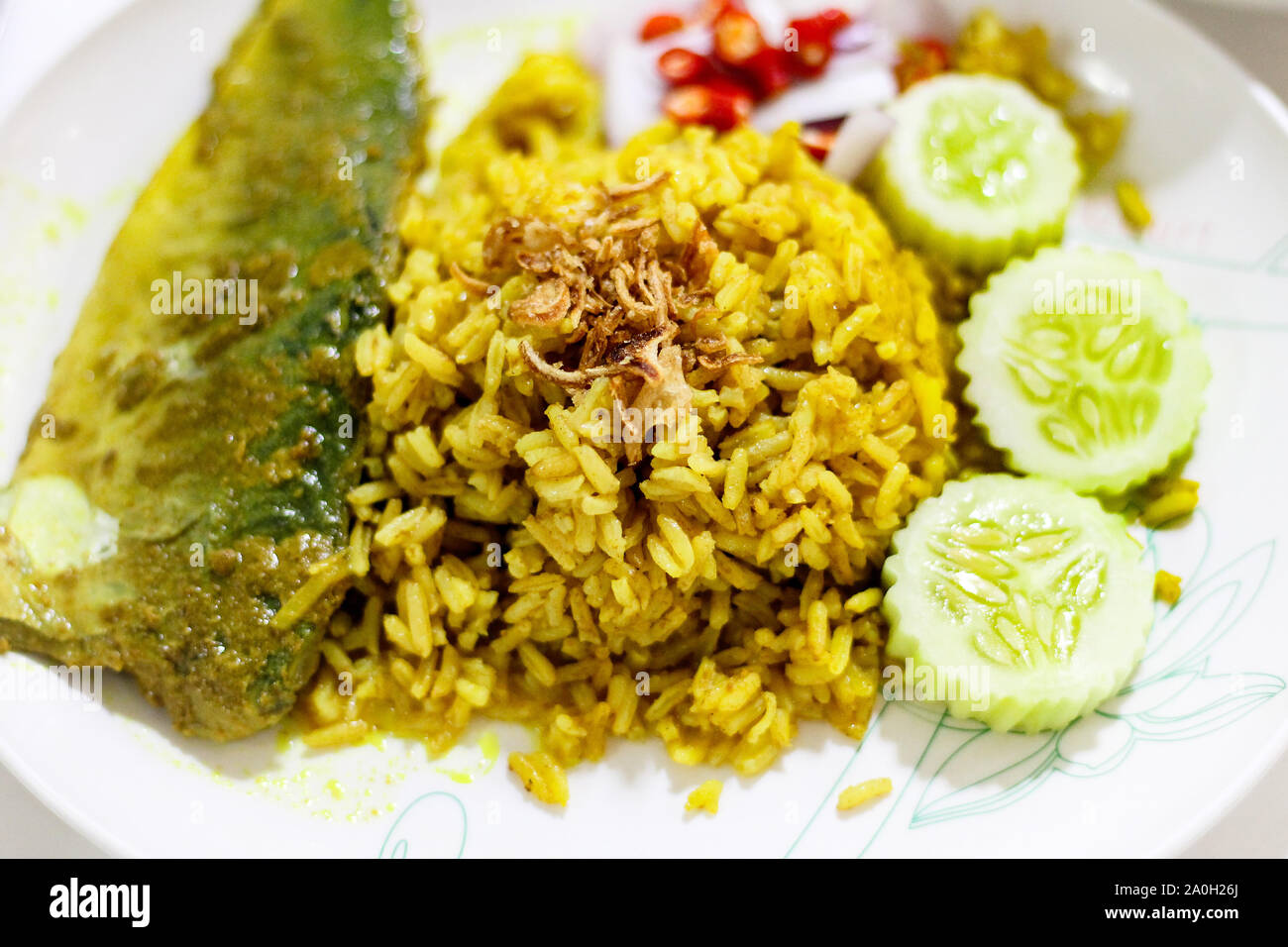 Close up of authentic Indonesian halal meal of Kari Ikan and nasi