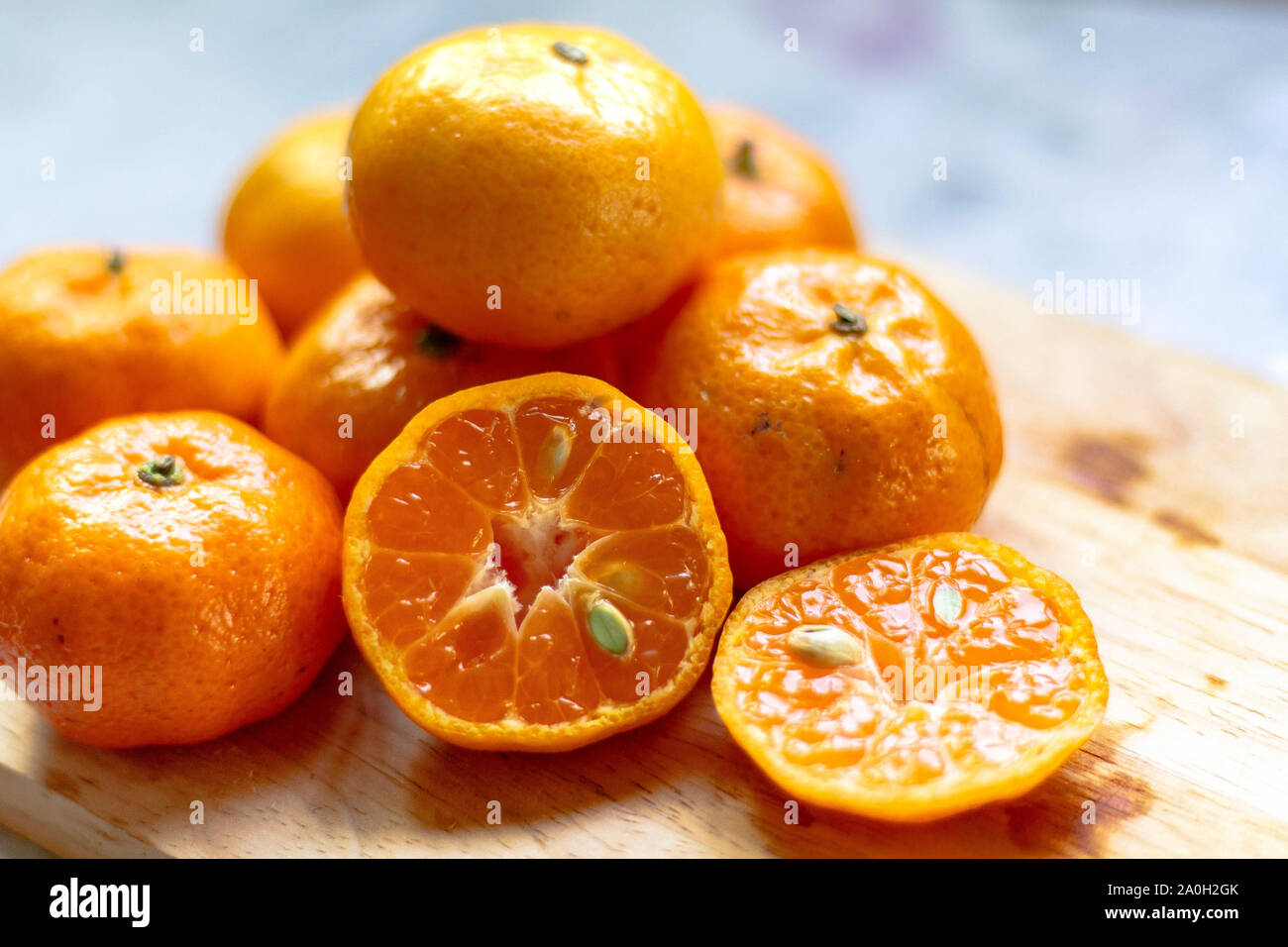 Still life photo of fresh clementine oranges to show concept of health, nutrition, clean living
