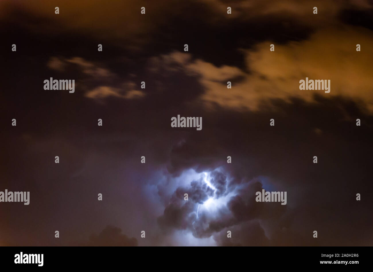 Lightning at cloudy dark Night scene. Stock Photo