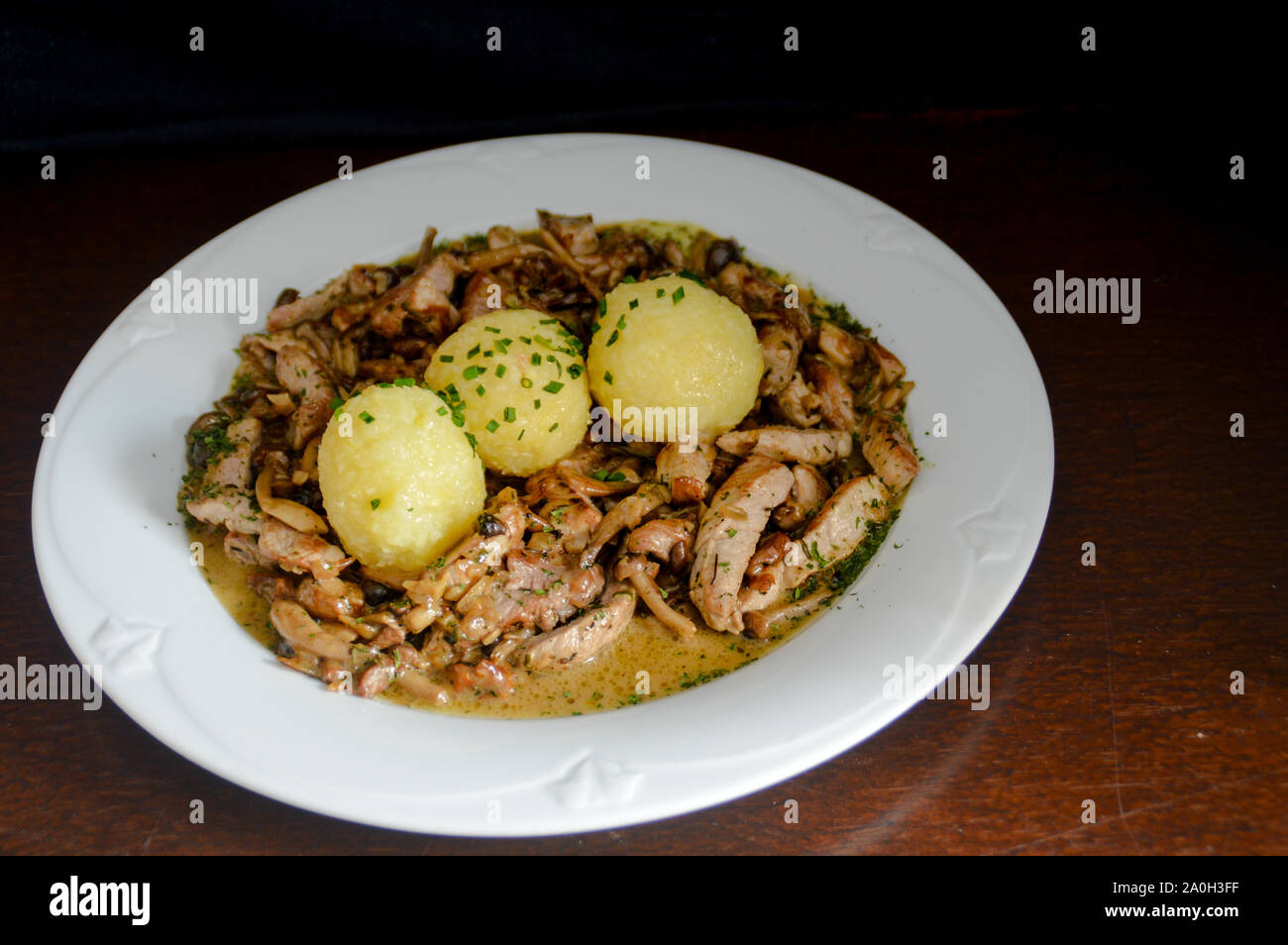 German Potato Dumplings (Kartoffelkloesse), traditional dish that is most popular in South Germany Stock Photo