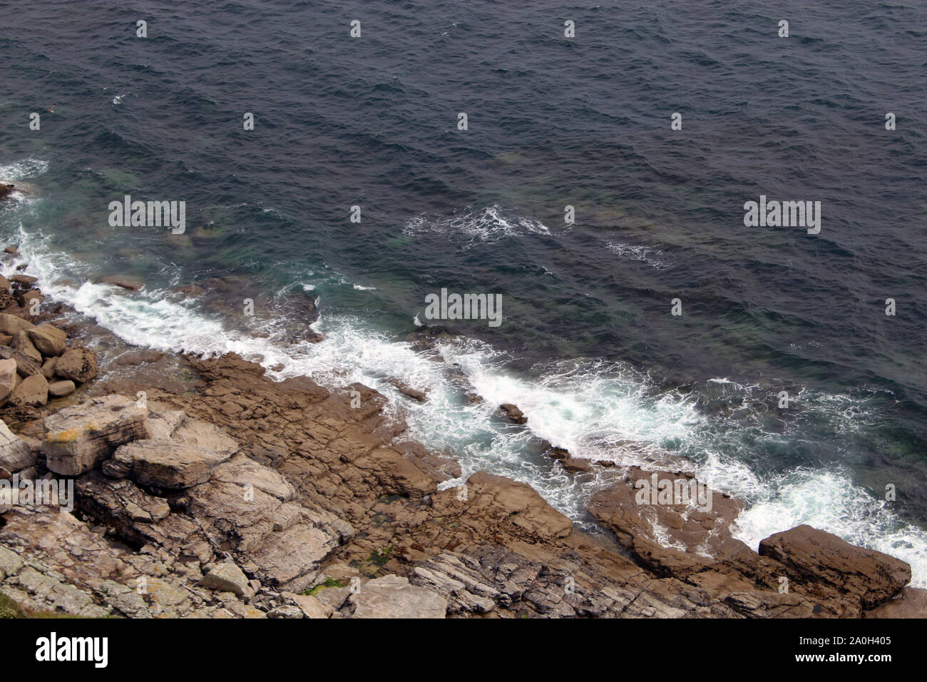 Waves crashing to shore Stock Photo