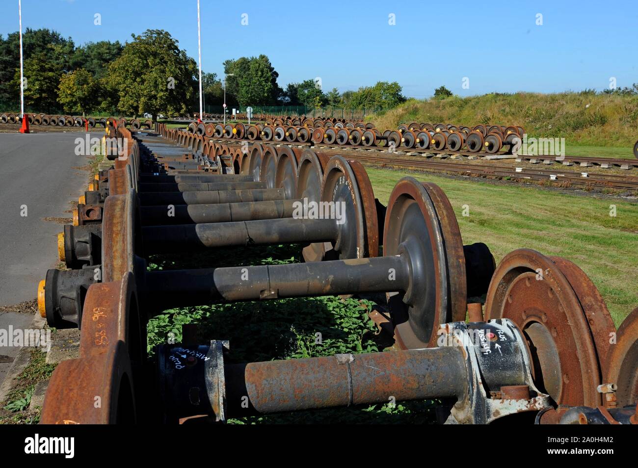 Rows of spare wheelsets for DMU trains and coaches lined up in storage at Quinton Rail Tech Centre Stock Photo