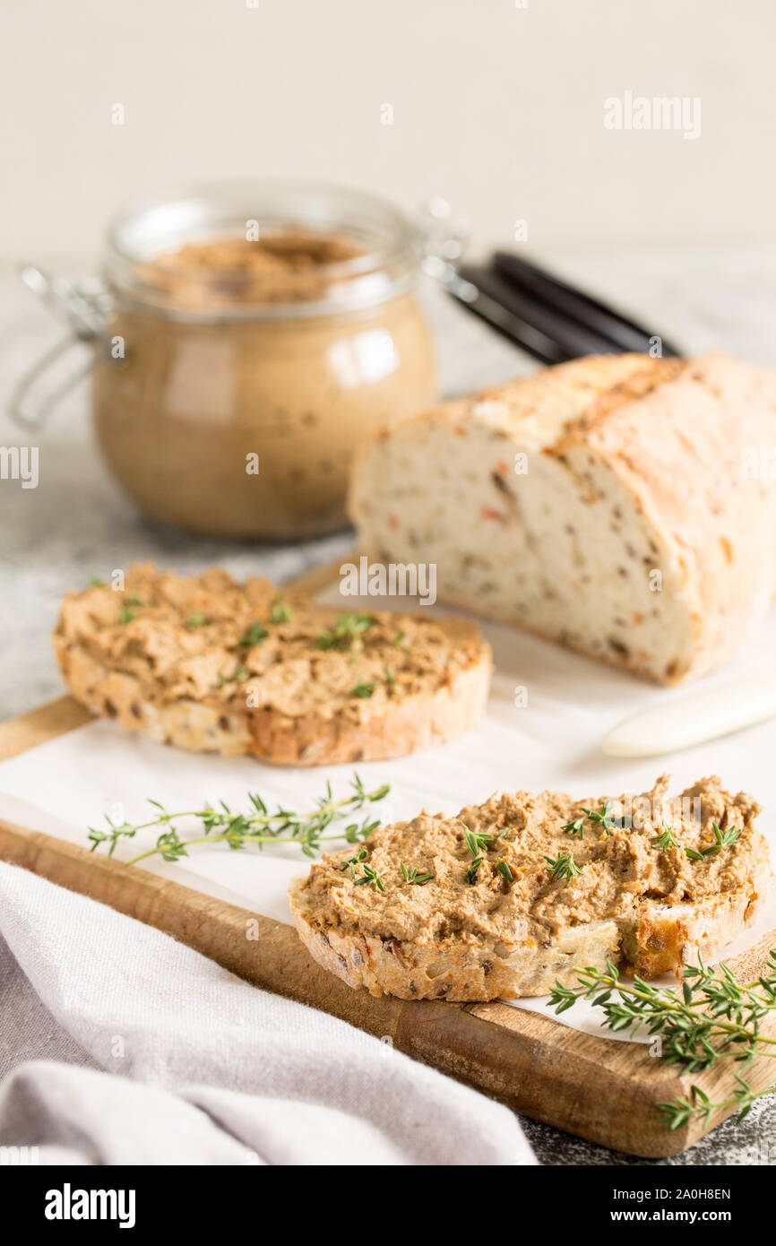 Fresh homemade chicken liver pate. Chicken liver pate on bread and in