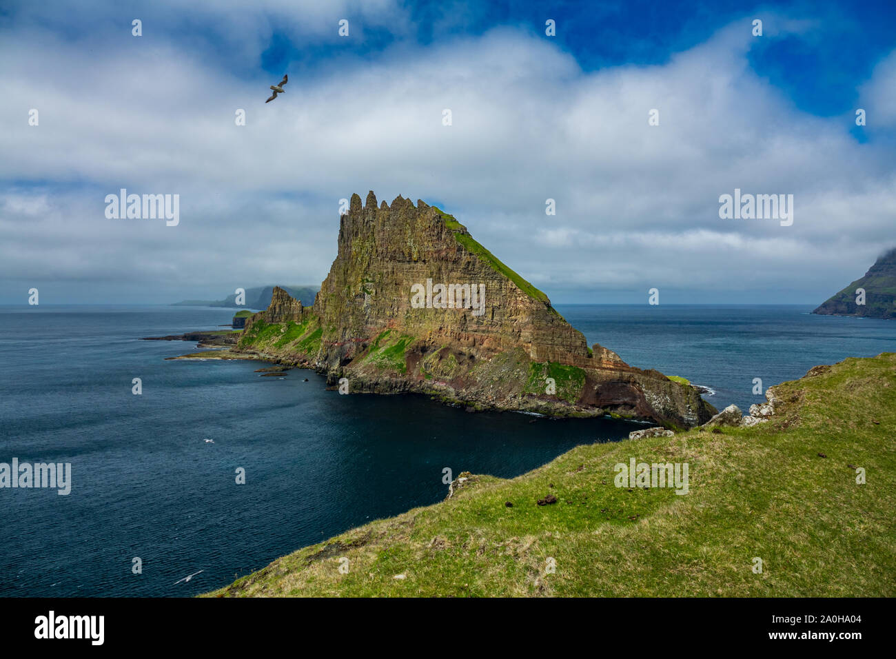 Amazing profile view of Tindholmur vertical cliff, Faroe Islands Stock ...