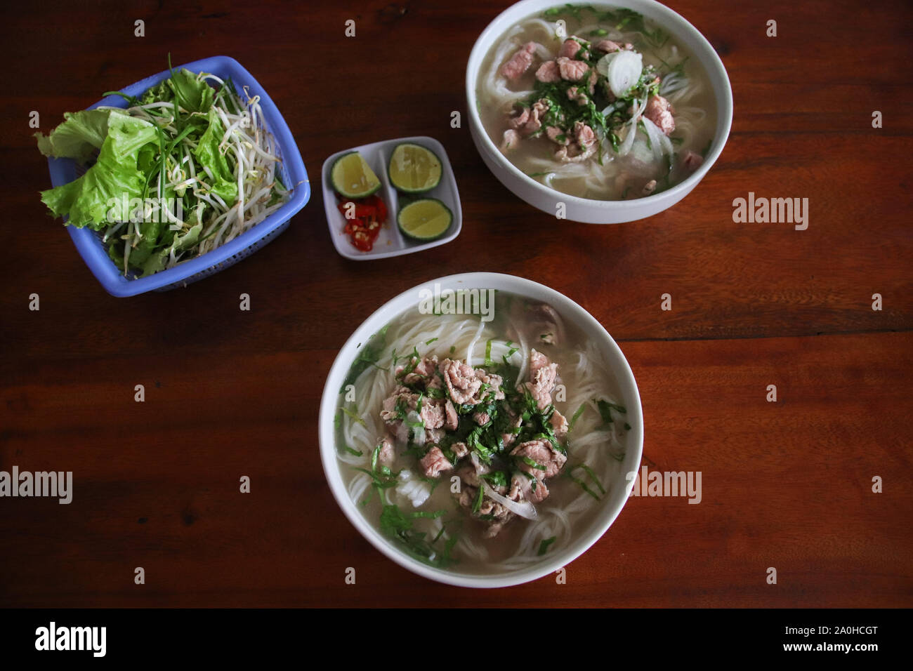 Iconic Vietnamese dish called pho bo or beef noodles soup Stock Photo