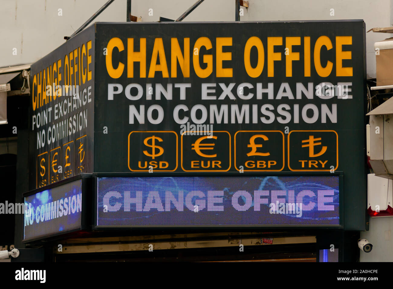 Generic led board box with currency signs and 'CHANGE OFFICE' text. USD, EUR, GBP and TRY currency signs for Dolar, Euro, Pound and Turkish Lira. Stock Photo