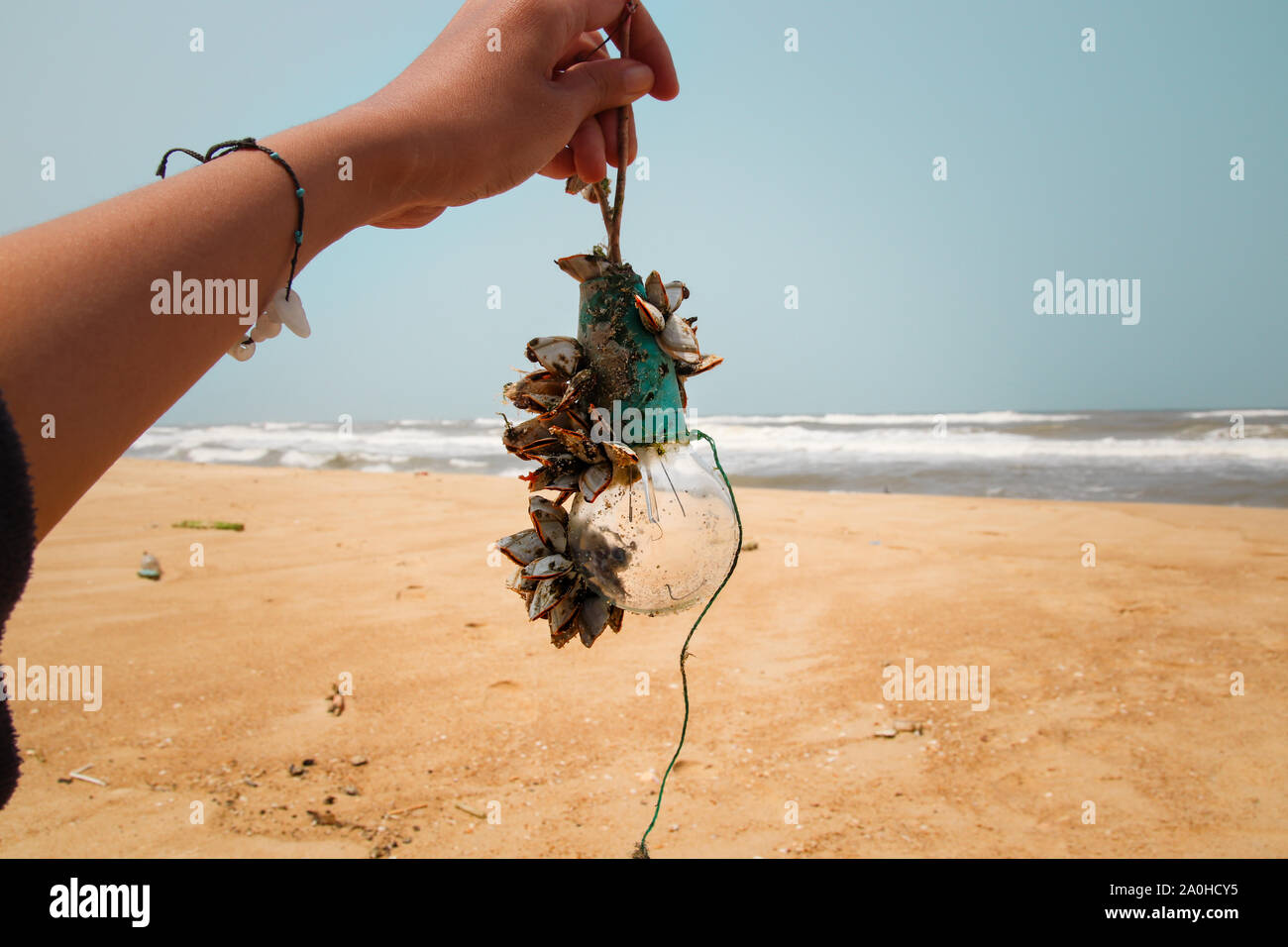 Beach clean up, fighting pollution and promoting positive changes Stock Photo